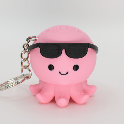 Cute pink octopus fidget clicker with glued on sunglasses for a summer party look