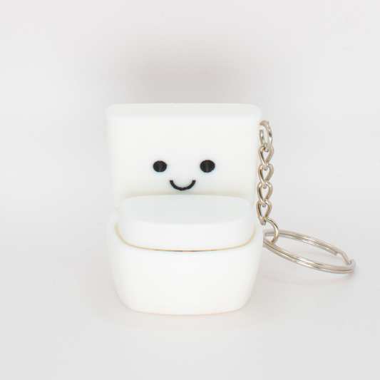 Funny cute toilet fidget clicker keychain with a smiling face