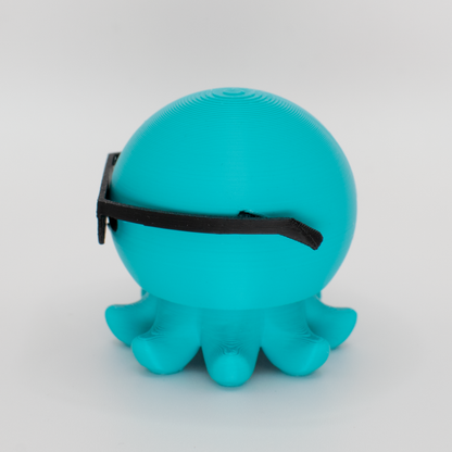 Side view of an original octopus mechanical switch fidget toy
