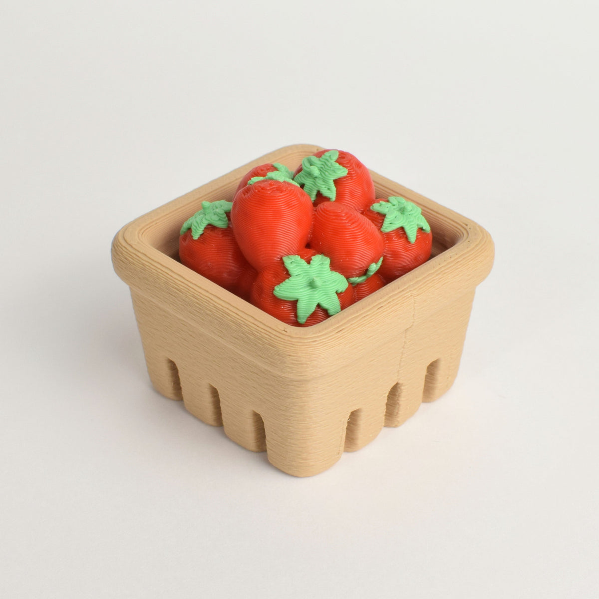 Back view of an original strawberry basket fidget clicker keychain
