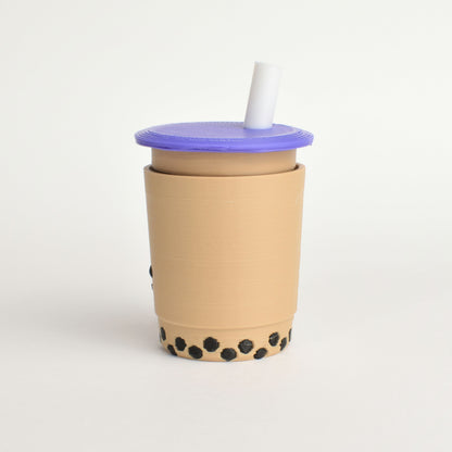 Side view of an original bubble tea fidget clicker keychain with purple lid