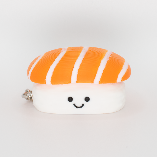 Cute salmon sushi fidget clicker keychain with an adorable smiling face