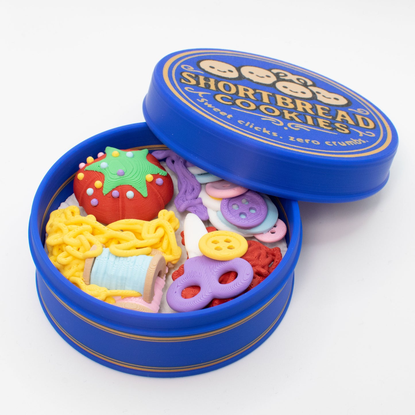 Cute sewing kit cookie tin fidget clicker with tiny sewing supplies and a nostalgic blue tin design