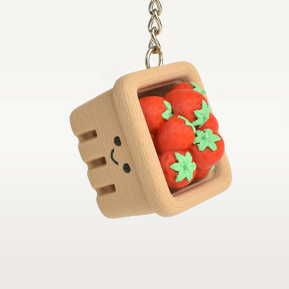 Strawberry basket fidget clicker keychain hanging as a cute bag charm or key accessory