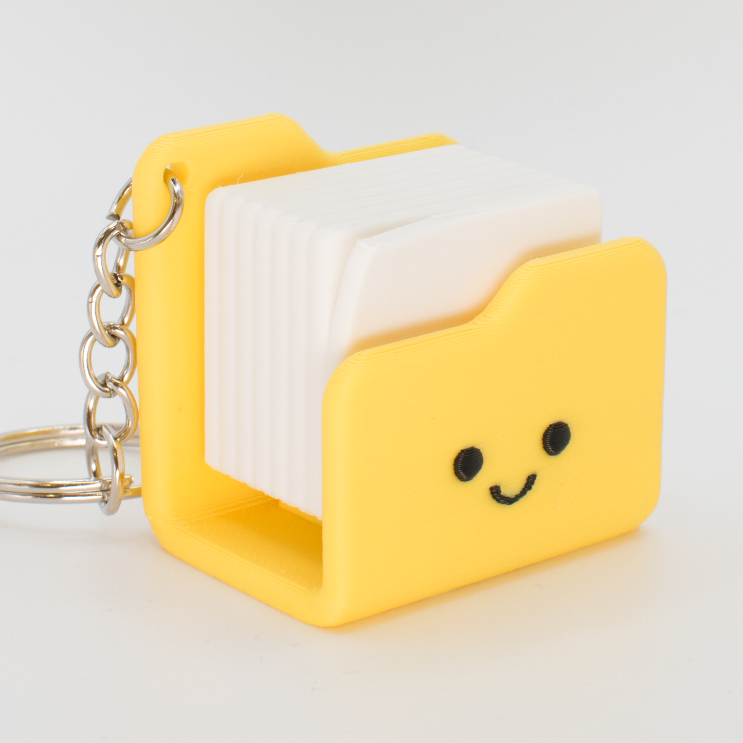 side view of a cute yellow folder fidget clicker inspired by a Windows style folder icon