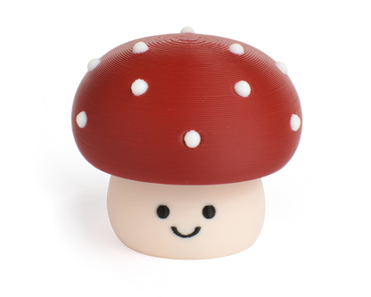Cute toxic mushroom fidget clicker with a chubby cap and white dots and smiling face