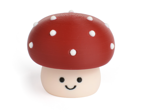 Cute toxic mushroom fidget clicker with a chubby cap and white dots and smiling face