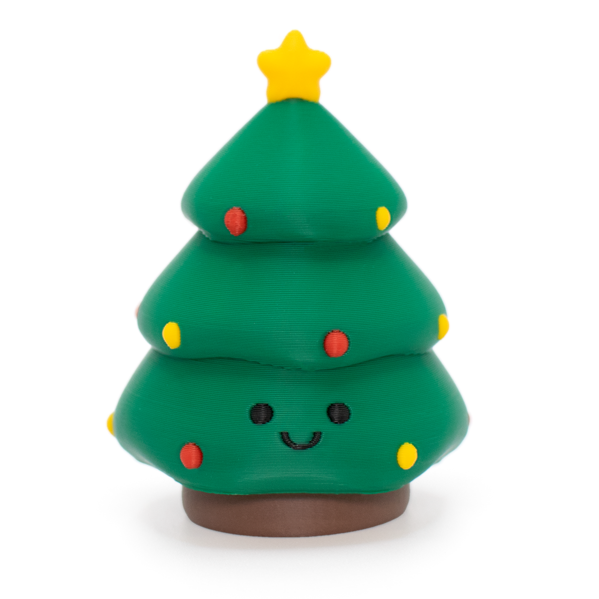 fidget clicker styled as a cute christmas tree with a smiley face and a star on top