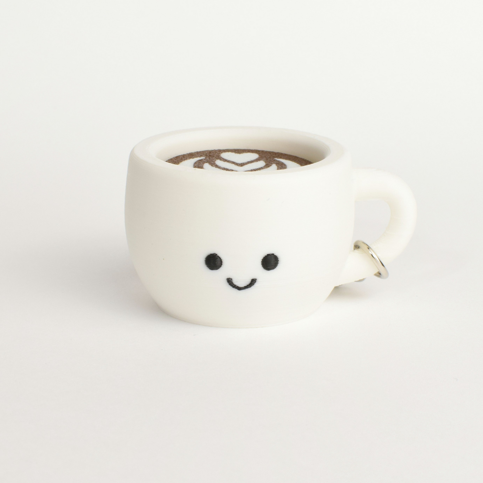 cute latte coffee cup fidget clicker keychain with a smiling face