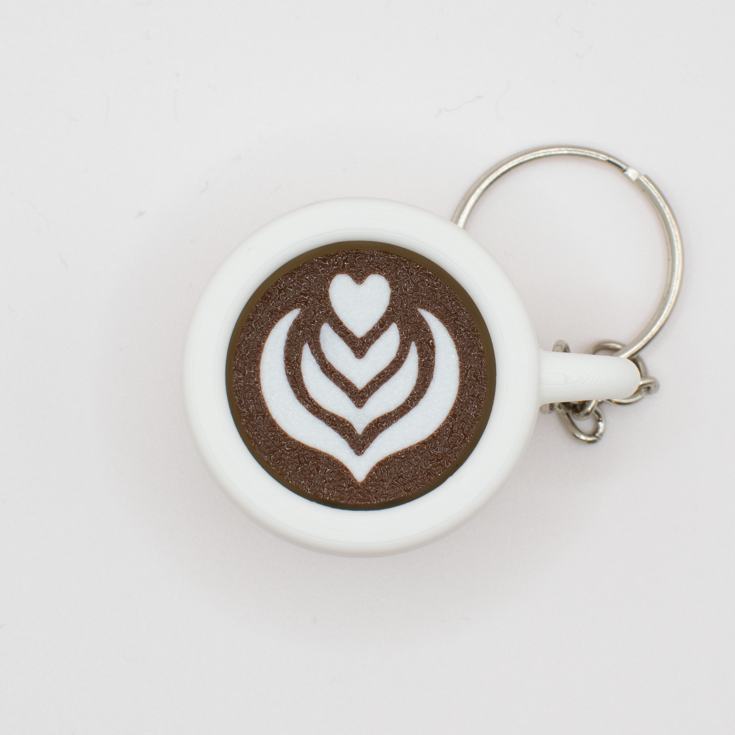 Top view of the coffee clicker with a high-quality 3d printed latte art design 