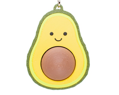Avocado fidget toy keychain with a smiling face