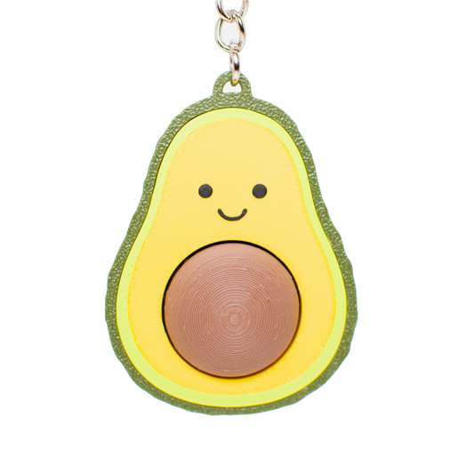 Avocado fidget toy keychain with a smiling face