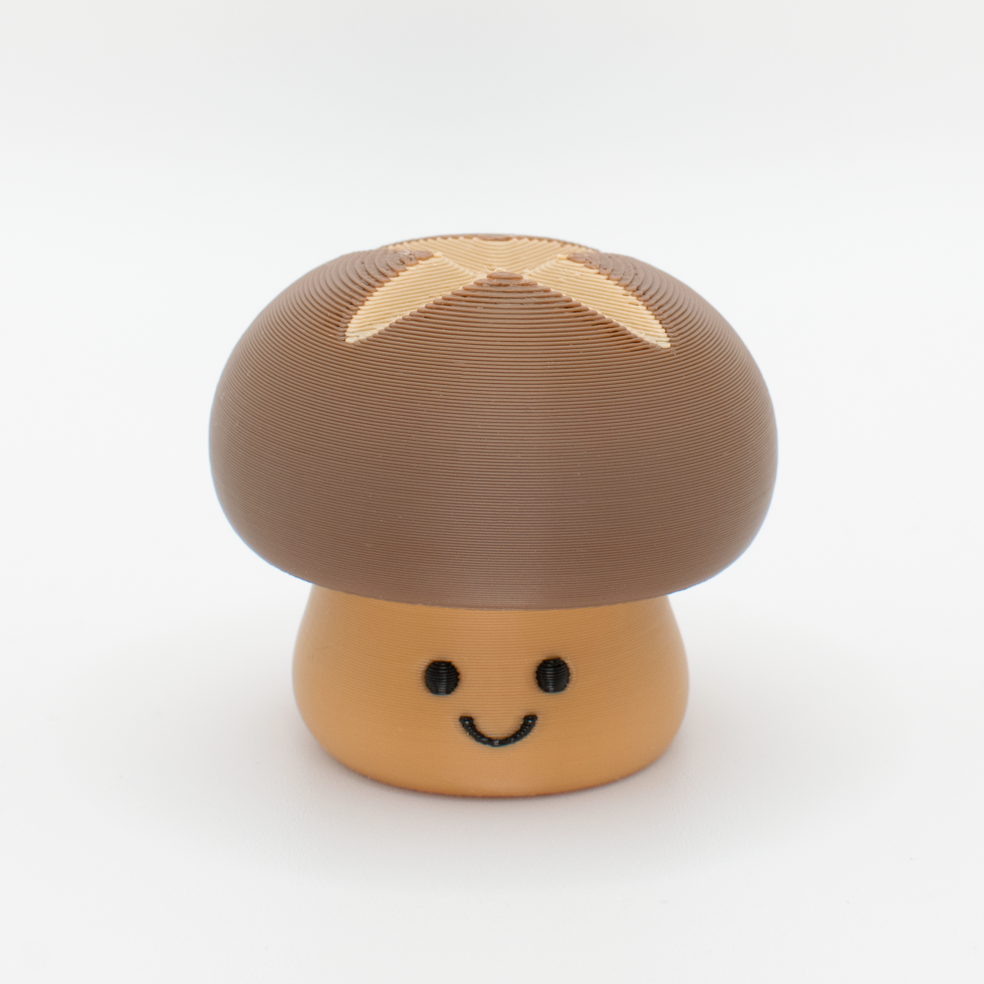 Cute mushroom fidget clicker with a chubby cap and smiling face