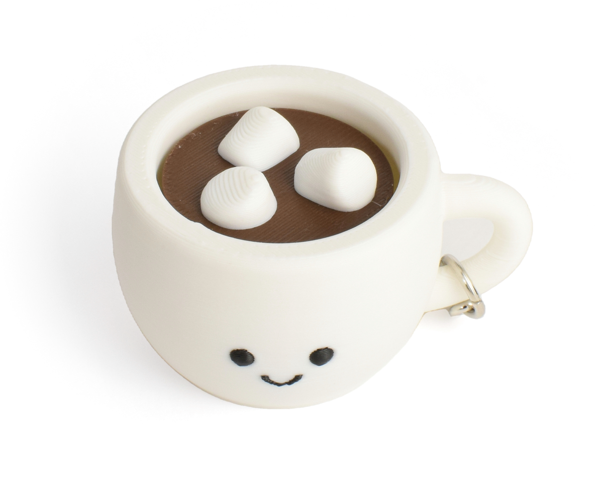 fidget clicker styled as a hot chocolate with marshmallows in a white mug with a smiley face on a white background