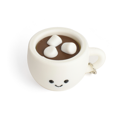 fidget clicker styled as a hot chocolate with marshmallows in a white mug with a smiley face on a white background