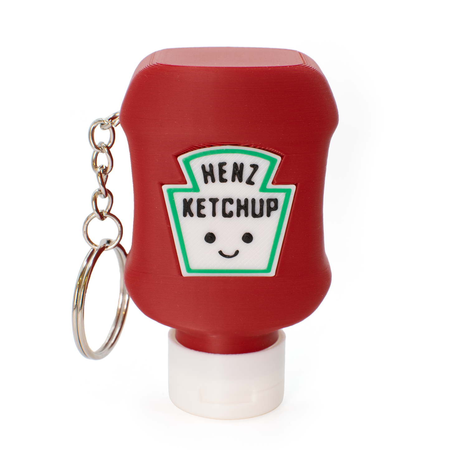 Red ketchup bottle fidget clicker keychain with a smiley face