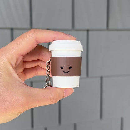 Clicking a coffee fidget clicker with a satisfying clicking sound 