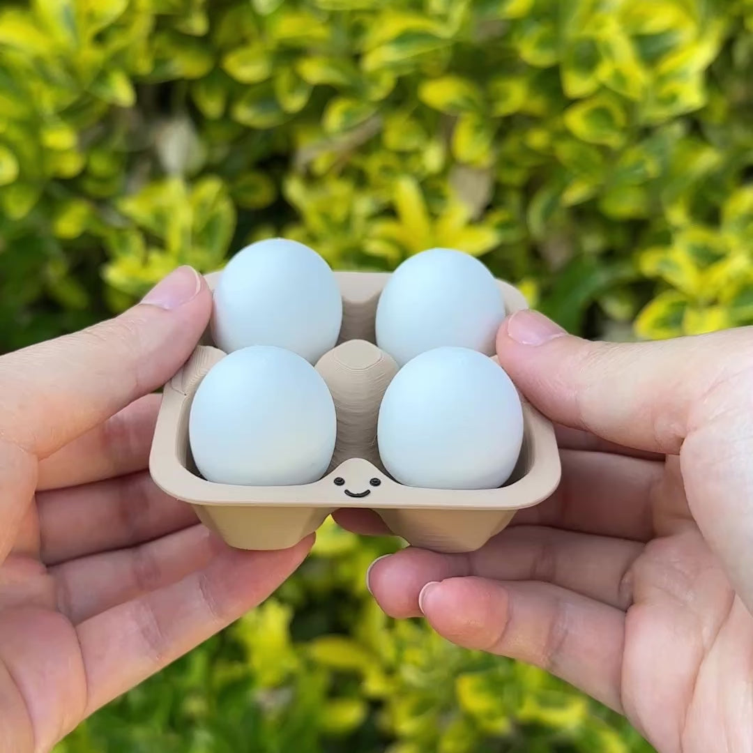 fidgeting with the egg carton clicker toy