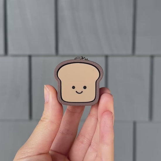 showing and clicking a loaf of whole grain bread fidget toy with a satisfying sound