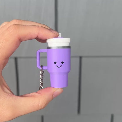 clicking a purple mini tumbler fidget clicker