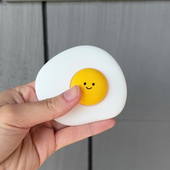 showing and clicking the cute fried egg fidget clicker