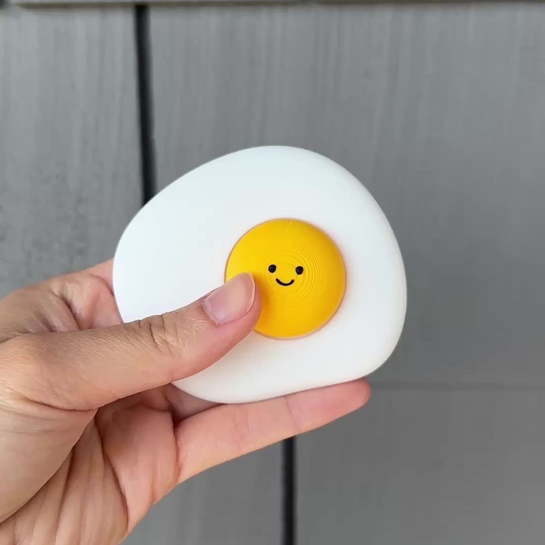 showing and clicking the cute fried egg fidget clicker