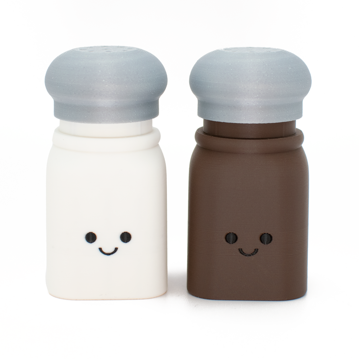fidget clicker styled as salt and pepper, with clickable top