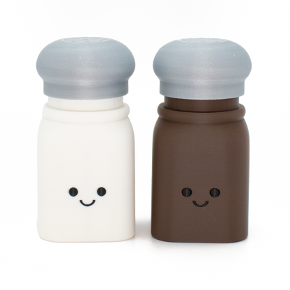 fidget clicker styled as salt and pepper, with clickable top