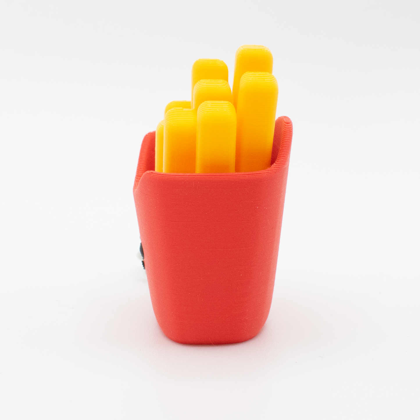 side view of a cute fast food French fries fidget clicker keychain