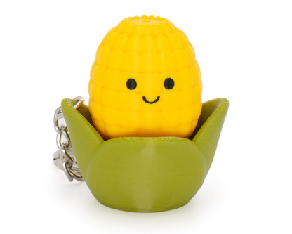 fidget clicker styled as a cute yellow and green corn with smiley face