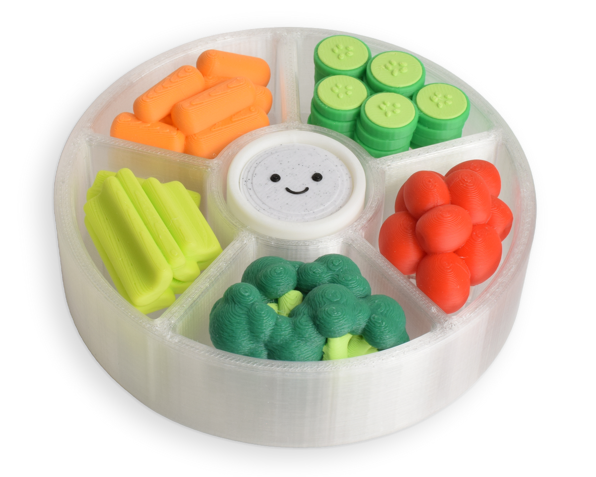 A colorful veggie platter clicker fidget toy with multiple switches (6) and a smiley face on a white background. There are carrots, cucumbers, cherry tomatoes, celery, broccoli, and a dipping sauce.
