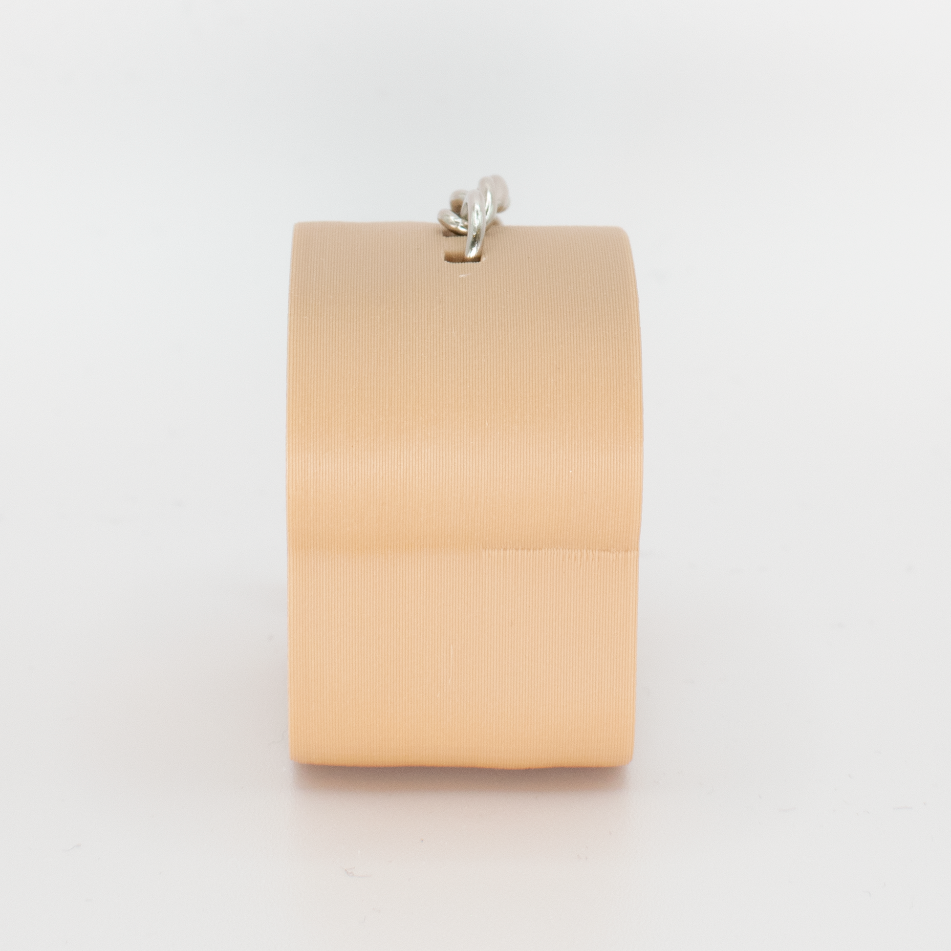 side view of a white bread fidget clicker keychain