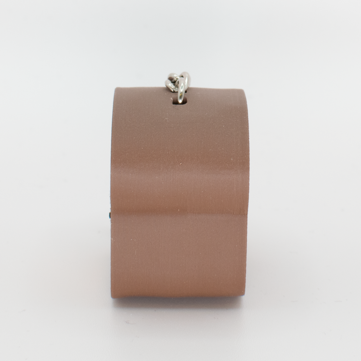 side view of a brown bread fidget clicker