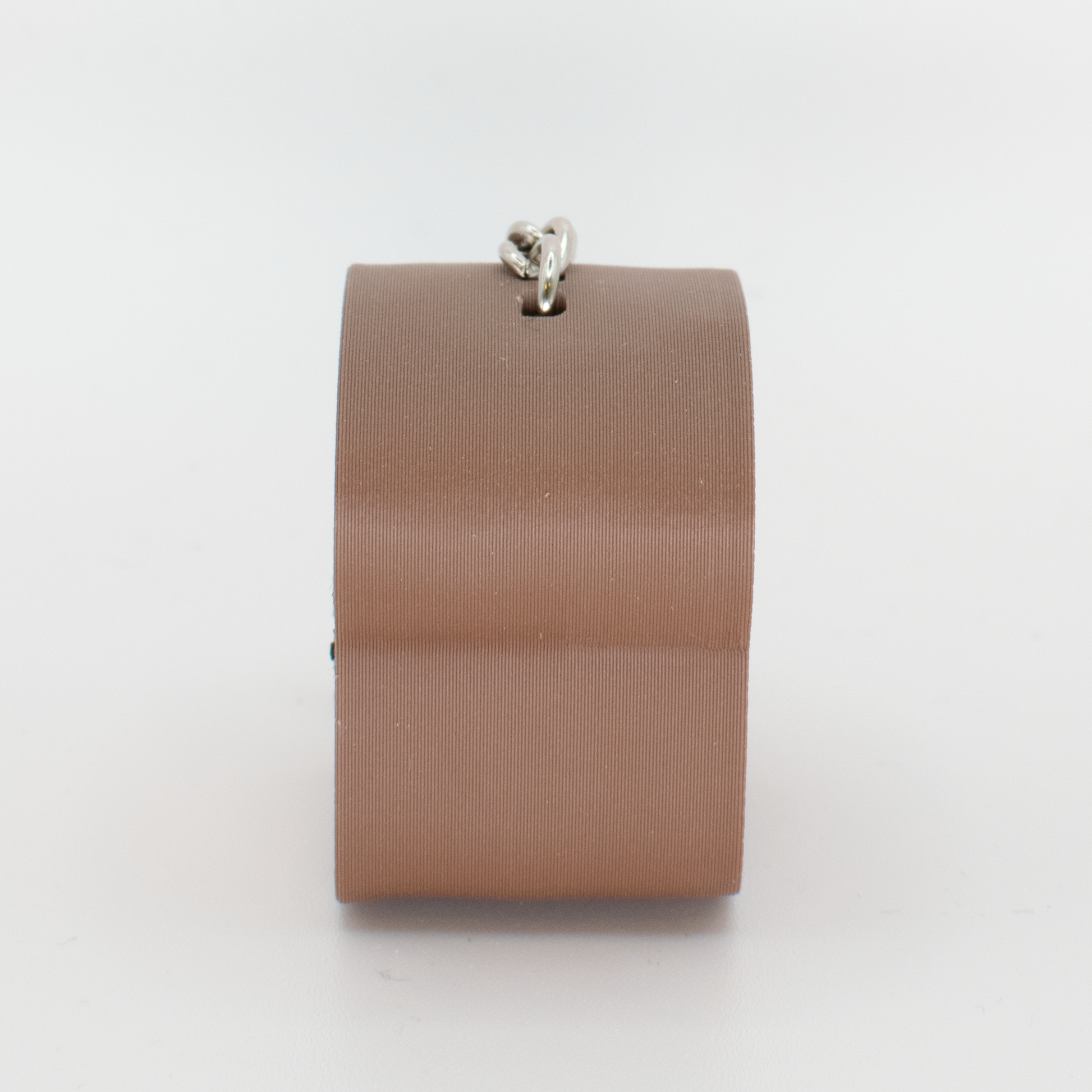 side view of a brown bread fidget clicker