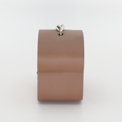 side view of a brown bread fidget clicker